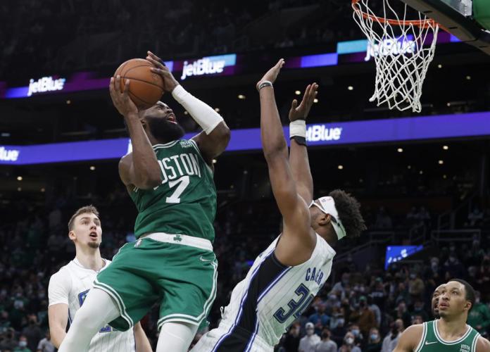 Brown scores 50, rallies Celts to 116-111 OT win over Magic