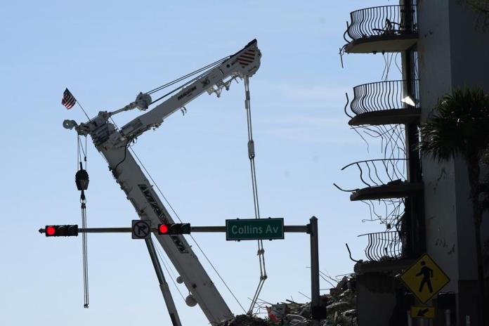 Drilling nearly done to demolish rest of collapsed condo