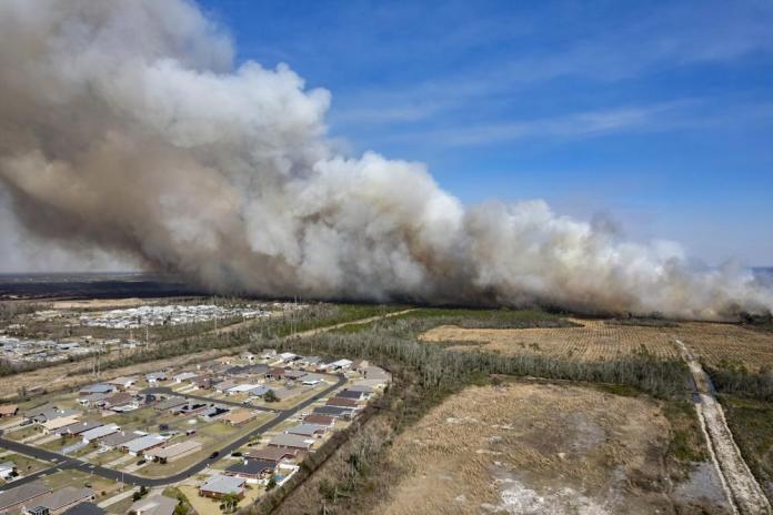 Fire forces evacuation of 100s of homes in Florida Panhandle