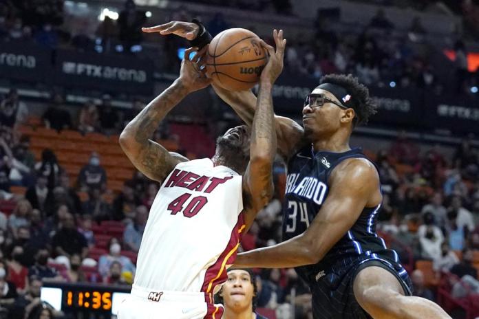 Heat win 3rd straight, pull away from Magic 93-83