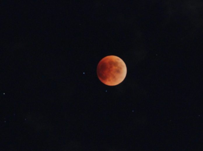 Moon goes blood red for stargazers across North and South America